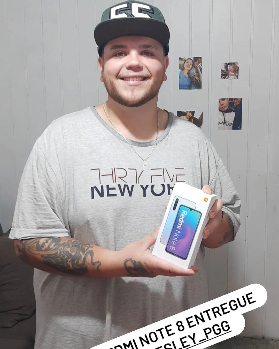 Cliente da MiTech com o aparelho recebido